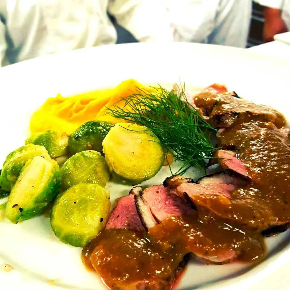 Grilled Duck w/ orange fig demi glace, parsnip and cauliflower puree and hazelnut Brussel sprouts|Zachary Portolanoさん