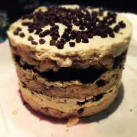 Snapdishの料理写真:christina tosi's chocolate chip layer cake with passion fruit curd & chocolate crumb &coffee frosting.|曹斐さん