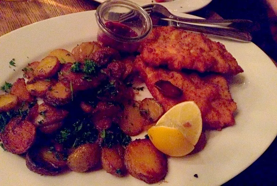 Schnitzel (German food) pork cutler with breadcrumbs.|keroさん