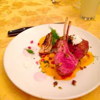 Seared lamb chop, anise infused butternut squash purée, pistachio & mint gremolata, Pomegranate yogurt and braised fennel.|Joshua Robinsonさん