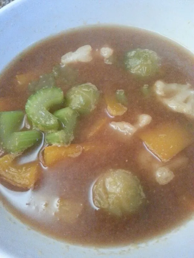 robust veggie soup. with yellow bell, cauliflower, brussel sprouts,  and corn.|Polly Gelfusoさん