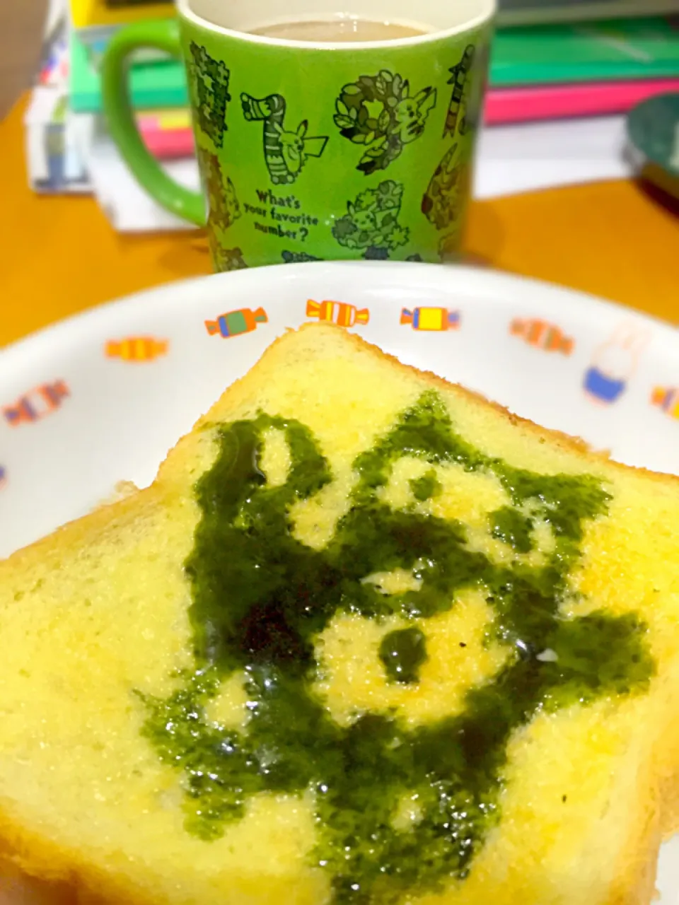 Snapdishの料理写真:バタートースト  抹茶みつで  子供が描きかき🖌これ  なぁ〜に⁉️  ＆カフェオレ☕️|ch＊K*∀o(^^*)♪さん