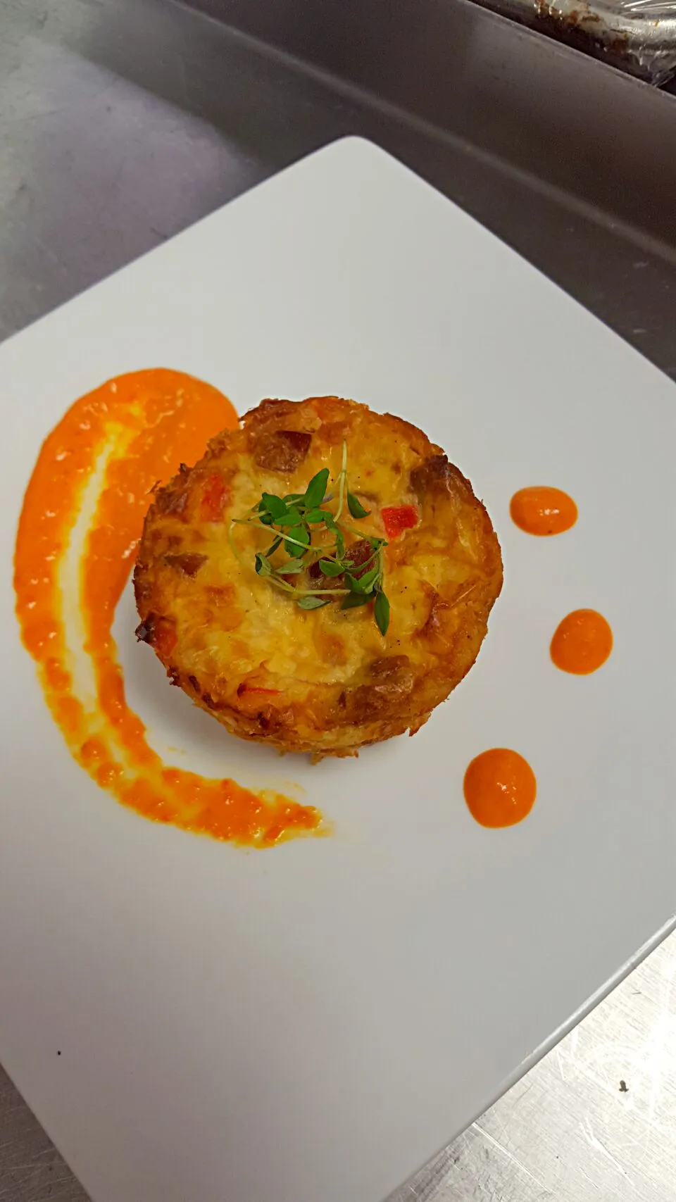 Chorizo and shrimp cheesecake with a citrus infused roasted red pepper sauce|Jacki Carterさん