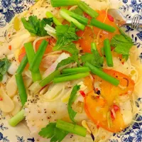 Snapdishの料理写真:Steamed fish with tomatoes, ginger on noodles, topped with spring onions & cilantro|Phillis L Boedigheimerさん