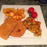 Snapdishの料理写真:Chicken escalopes with roasted veg with a potato cubes|Daniel Allchinさん