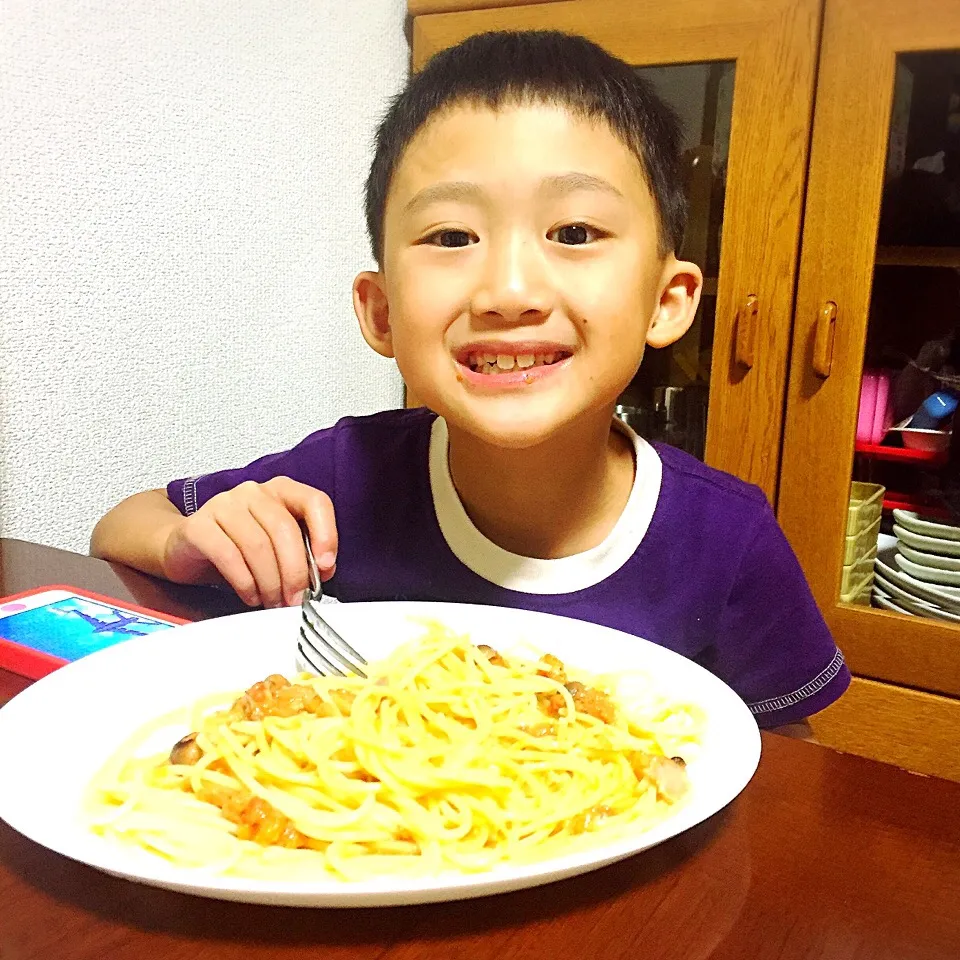 Snapdishの料理写真:My son Rui enjoying his Bacon-Tomato in white cream Pasta|Laarni Nabongさん