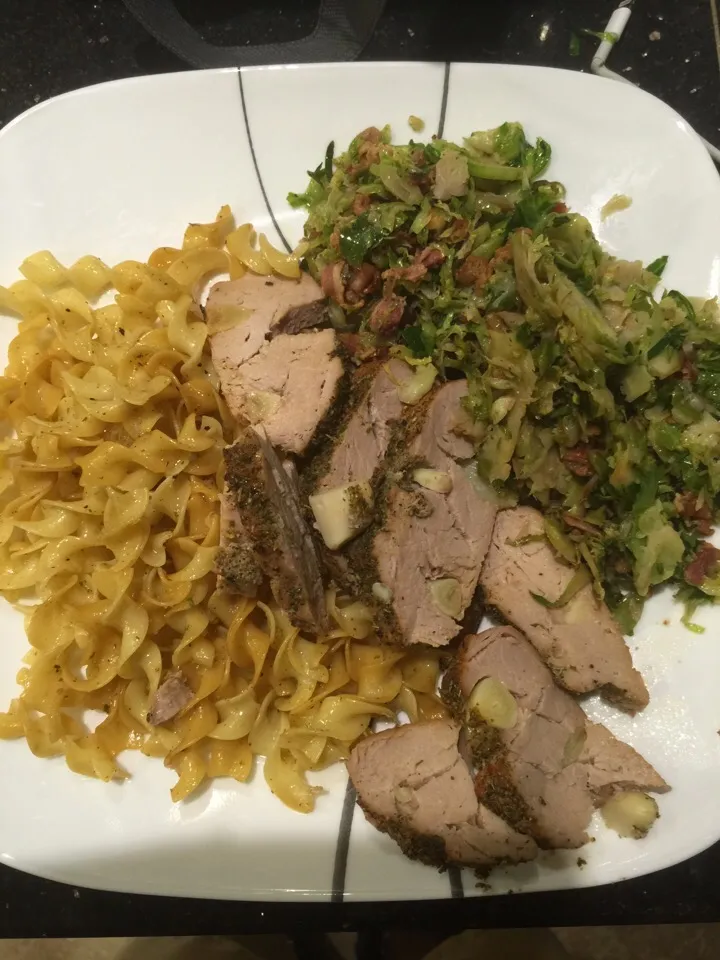 Buttered noodles, garlic seasoned pork loin & shredded Brussels sprouts w/ caramelized onions & bacon.|Richard Thompsonさん