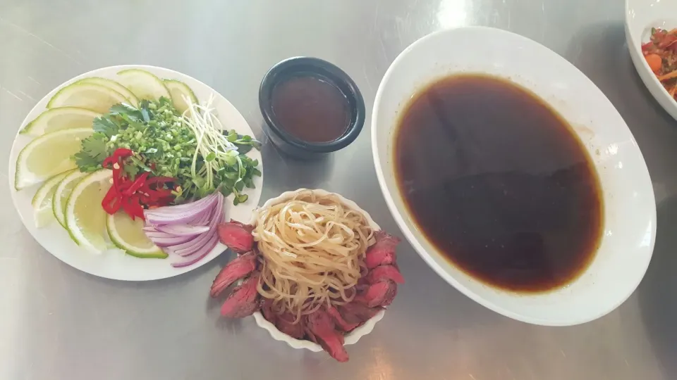 Snapdishの料理写真:Phó Bo  (Vietnamese Rice Noodles in Broth) & Phó Bo Garnish|Louis Rodriguezさん