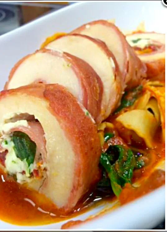 Prosciutto wrapped chicken breast with spinach,  mushrooms, boursin cheese,  fresh egg pasta, and tomato sauce. #delicious|Chef John Thomas Tapper IIさん