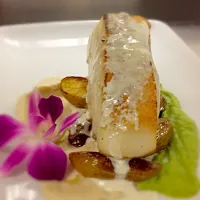 Snapdishの料理写真:Pan seared Sea Bass with roasted fingerling potatoes cauliflower & truffle  puree and sweet pea puree|robert denboさん