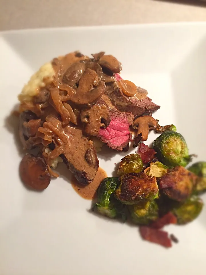 Pan seared venison w/ a bourbon, mushroom & horseradish cream sauce, mashed potatoes and garlic roasted brussel sprouts with bacon.|Liesel Ryanさん