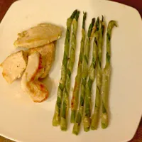 Snapdishの料理写真:Healthy dinner. Grilled chicken spiced with cumin, salt and pepper. And a side of parmesan spiral wonton wrapped asparagus.|Cooking My Butt Offさん