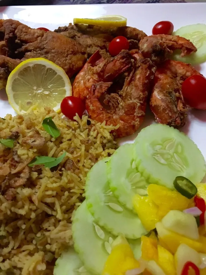 Seafood Briyani with the side dishes.|Joha Hassanさん