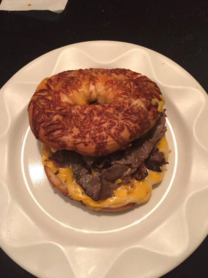 Parmesan bagel with roast beef and cheddar with ghost pepper cheese|adam adamsさん