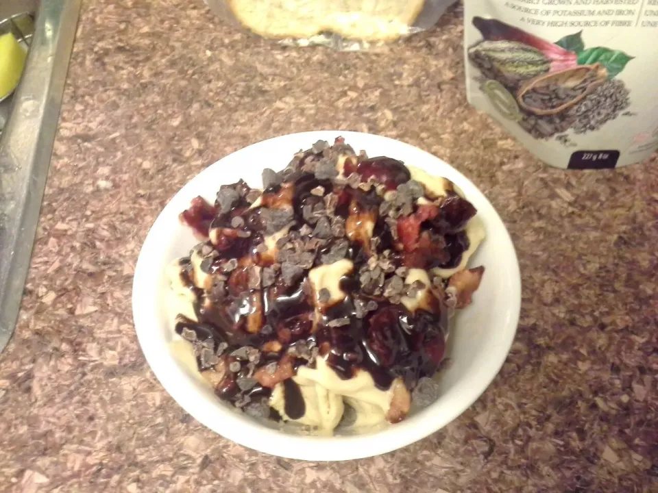 banana nicecream smothered in chocolate sauce, black cherries, with cacao nibs. #Vegan #nicecream #dessert #Chocolate #banana|veganadianさん