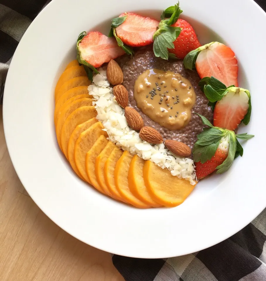 Dark chocolate chia pudding with fresh fruits, almonds, coconut flakes & peanut butter|coxiella24さん