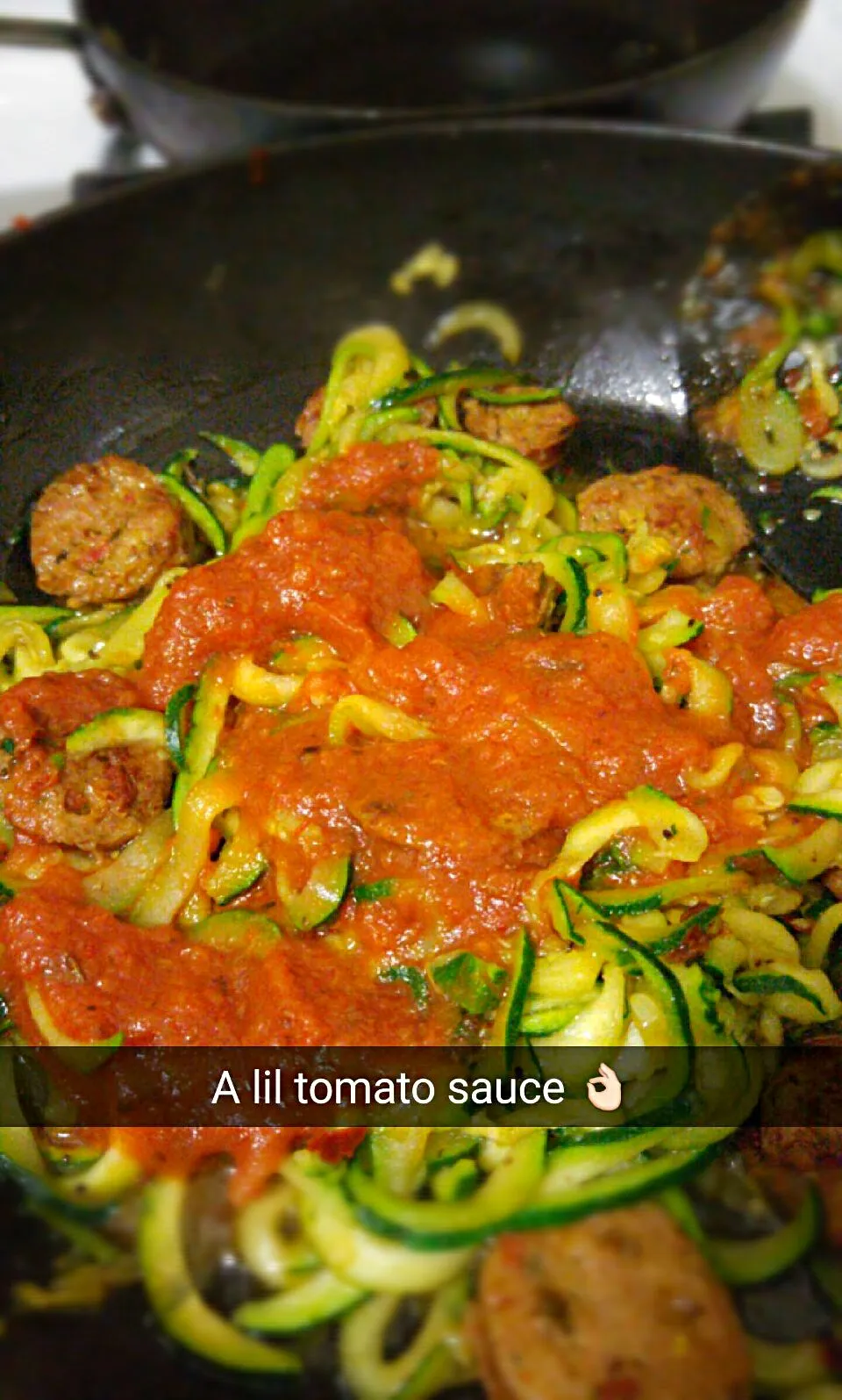 Zucchini noodles with tomato sauce and chicken sausage with sun dried tomatoes and basil.|Rosaさん