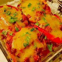 Snapdishの料理写真:Enchilada stuffed peppers with homeade new mexico chile enchilada sauce|Raema Williamsさん