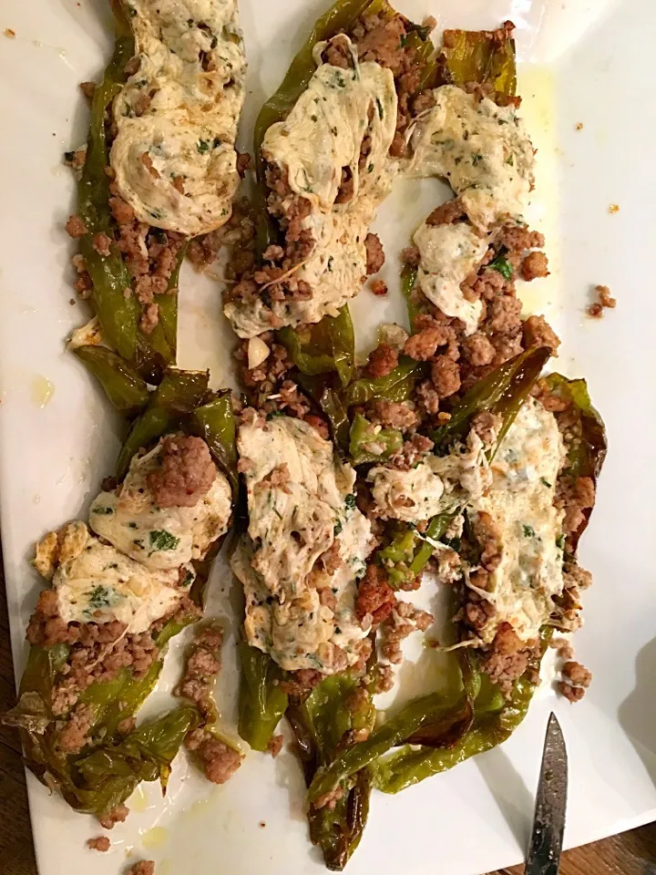 Long Italian hot peppers stuffed with ground veal sage parsley garlic and ropped with mozzarella cheese|danさん