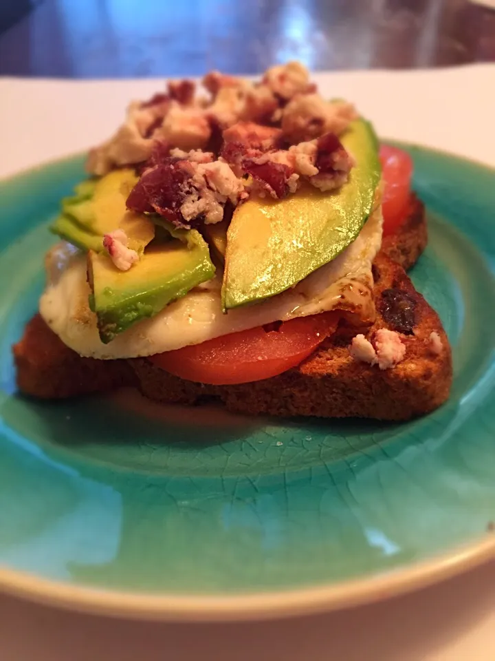 Avo and egg on Ezekiel with cranberry goat cheese|dee oさん