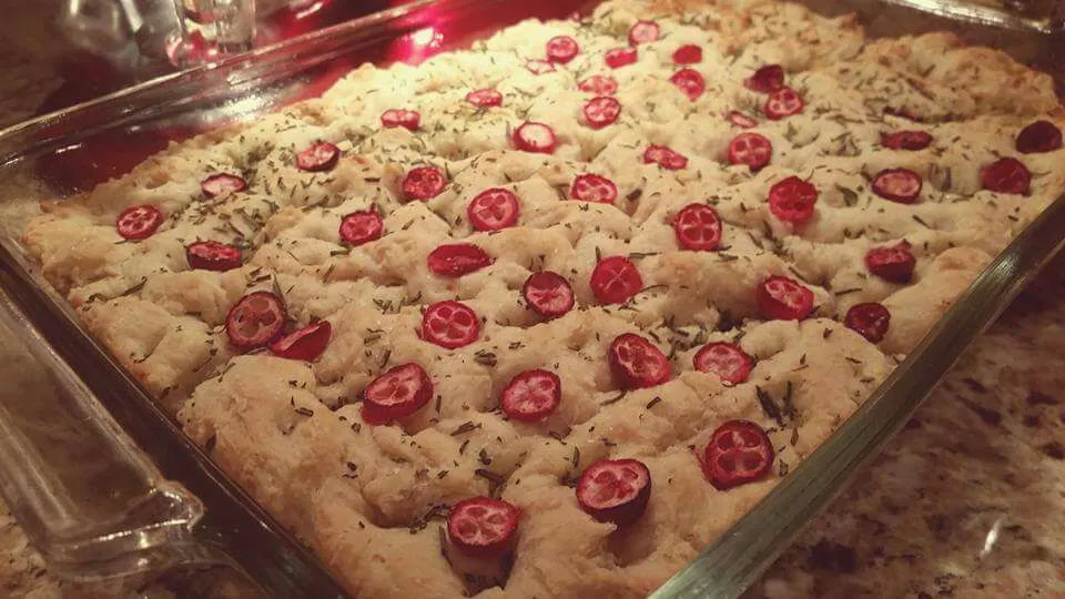 Snapdishの料理写真:Homemade Cranberry  rosemary focaccia bread.  l love the smell of homemade bread!!!|Jihollandさん