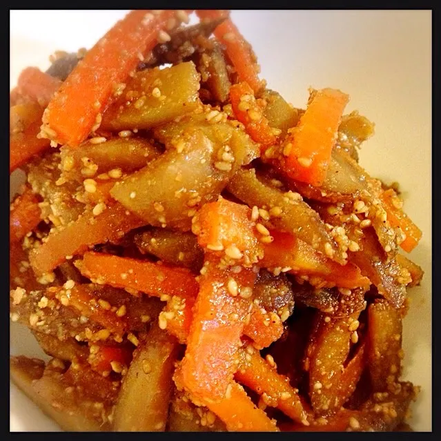 Snapdishの料理写真:きんぴらごぼう、胡麻まぶしで。Chopped Burdock root and Carrot cooked in sugar and soy sauce|toyamadaさん