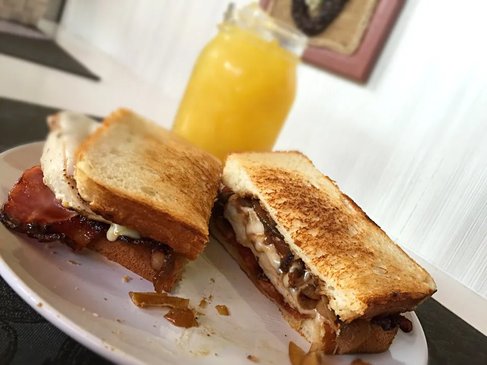 Snapdishの料理写真:Grilled chicken, crispy bacon, sautéed onions and havarti cheese toastie|Samuel Naylorさん