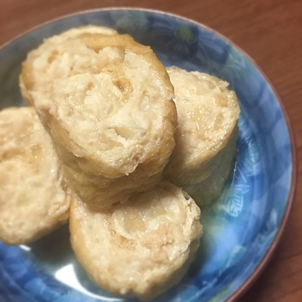 Snapdishの料理写真:鶏ひき肉のキツネさん巻き巻き煮|まるちゃんさん