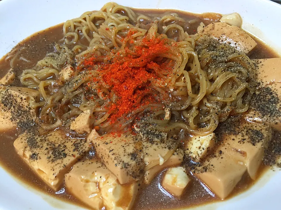 とんこつ醤油と熟成味噌バターの激辛ラーメン 京都の豆腐のせ|Hiroo  Higuchiさん