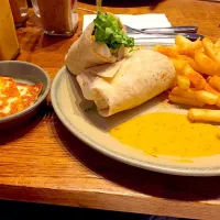 Snapdishの料理写真:Lemon and Herb Chicken Wrap With Piri Piri Chips and Halloumi|Harriet Pritchardさん