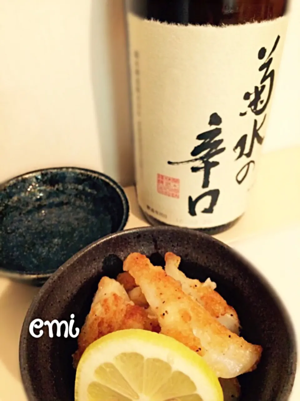 Snapdishの料理写真:菊水の辛口 と なんこつの塩レモン焼き✩|emiﾟ+｡:.ﾟஐ♡さん