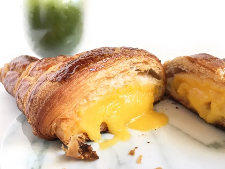 Snapdishの料理写真:Salted egg yolk lava croissant from Antoinette Sg|coxiella24さん