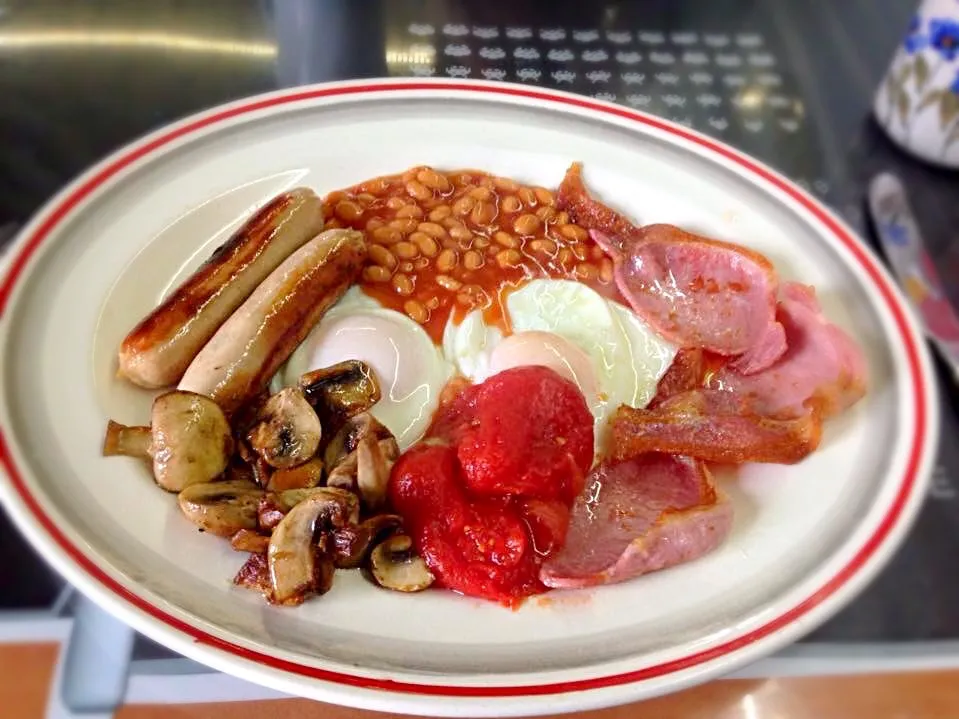 Another fry-up. Sausages, tomatoes, eggs , bacon.|Karla Collington Ryderさん