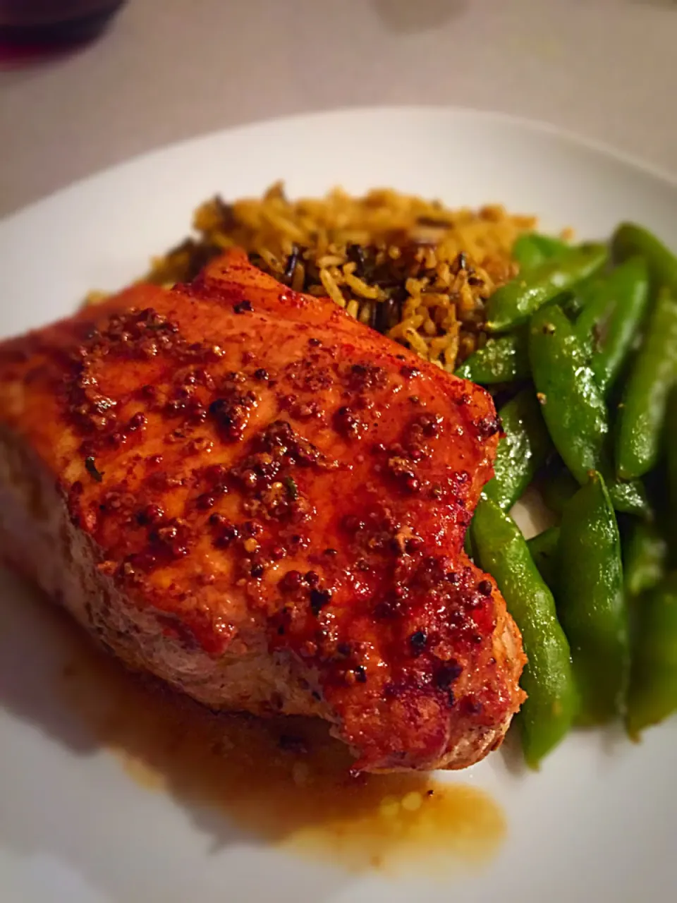 Snapdishの料理写真:Stone ground mustard & thyme thick cut pork chops, garlic sautéed sugar snap peas and wild rice|Liesel Ryanさん