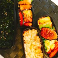 Snapdishの料理写真:兄さん弁当
式根島の海苔弁
お豆腐のつくね・卵焼き・カボチャとソーセージのクレイジーソルト炒め
ポテトサラダ
妹弁当
ピラフ➕  ☝️

ピラフは炊飯器で
明日はケチャップご飯！
使いまわさねばです💪|nagisaさん