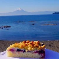 Snapdishの料理写真:One of the best crumbles I've had is in this little German town in Chile.  Here is a delicious kuchen with a volcano view.|Amandaさん