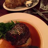 Snapdishの料理写真:Bison steak, baked potato|Elaine Cuylerさん