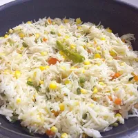 Snapdishの料理写真:Fried rice with corn and veggies|Swati Srinivasulaさん