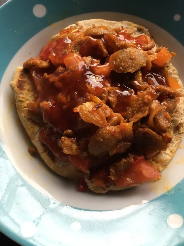 Snapdishの料理写真:Pita bread converted to mini pizza. With curry beef topping|Khadijah Ab Rahmanさん