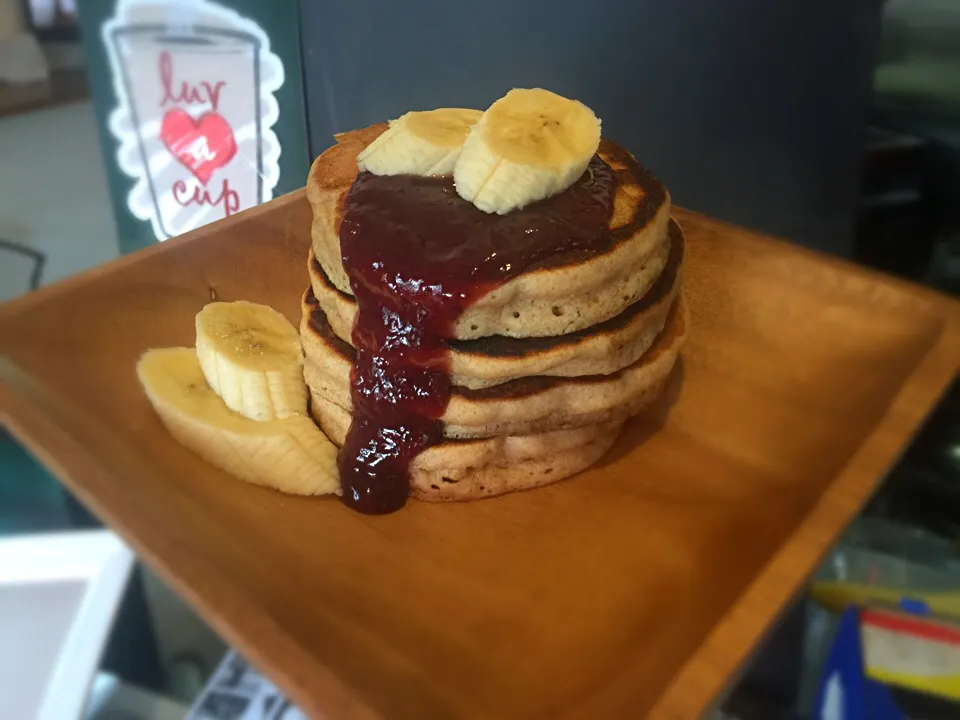 Snapdishの料理写真:Tall stack of 7grain organic pancakes with lemon raspberry sauce|Samuel Naylorさん