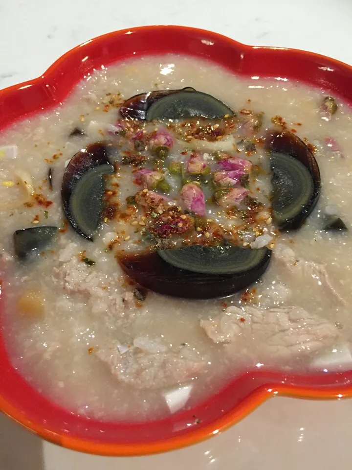 Snapdishの料理写真:Pork & Century Egg Porridge infused with Baby Rose Water.|Aunty Gさん