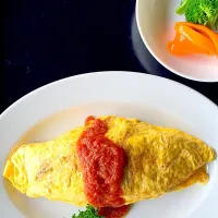 夫のランチ‼️大盛りオムライス😀
自家栽培のトマトで作った、ケチャップで…|椿さん