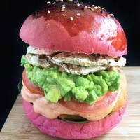 Snapdishの料理写真:Rainbow burger - homemade beetroot bun, gochujang cashew cream sweet potato-pistachio patty, smashed avocado, tomato slices, lotus root chips