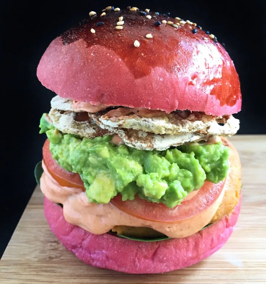 Rainbow burger - homemade beetroot bun, gochujang cashew cream sweet potato-pistachio patty, smashed avocado, tomato slices, lotus root chips|coxiella24さん