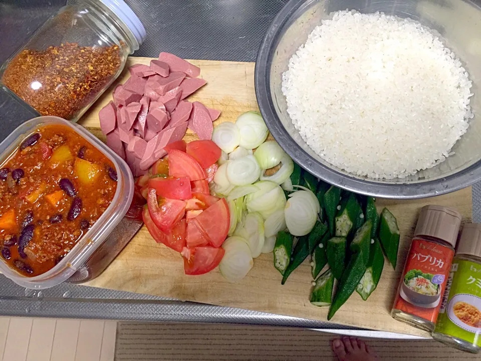 Snapdishの料理写真:Chilli beans Cajun smoked chicken sausage rice|yeni kartikasariさん