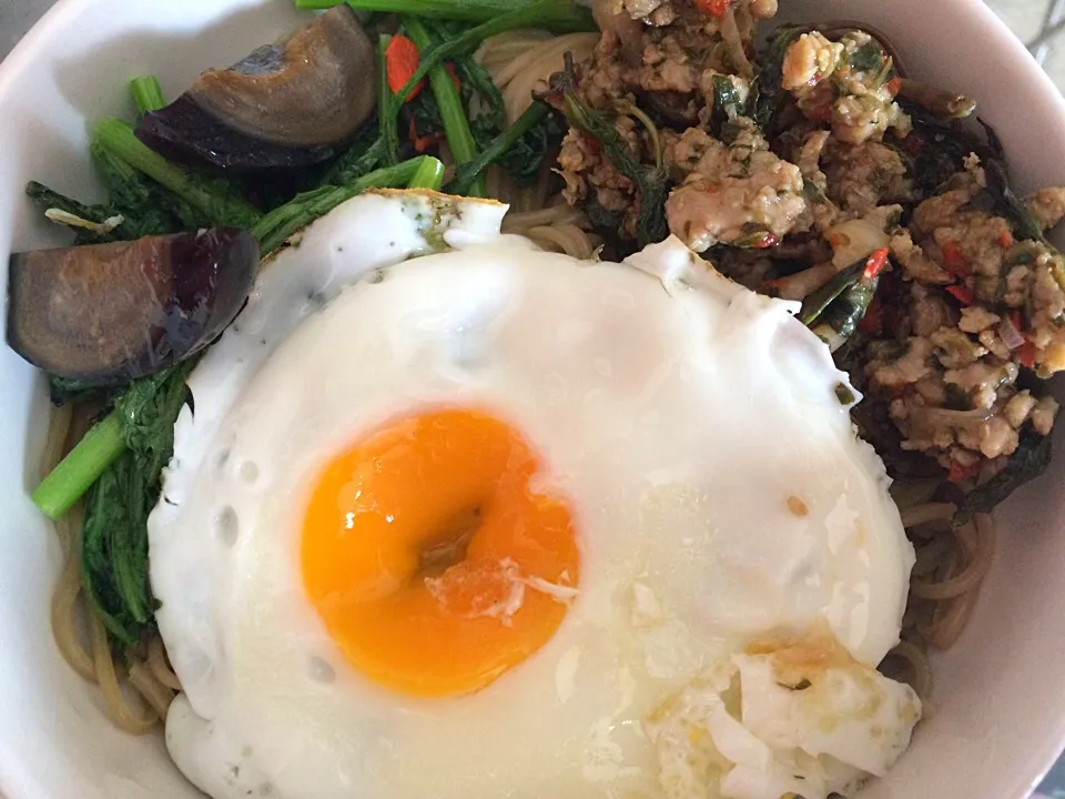 Soba with poached garland chrysanthemum and century egg, Thai basil chicken and sunny side up.|Ong Sor Fernさん