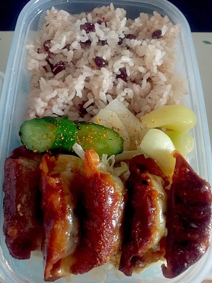 Snapdishの料理写真:パパお弁当🍱  揚げ餃子  キャベツの千切りサラダ  らっきょうの甘酢漬け  大根ときゅうりの漬物  お赤飯|ch＊K*∀o(^^*)♪さん