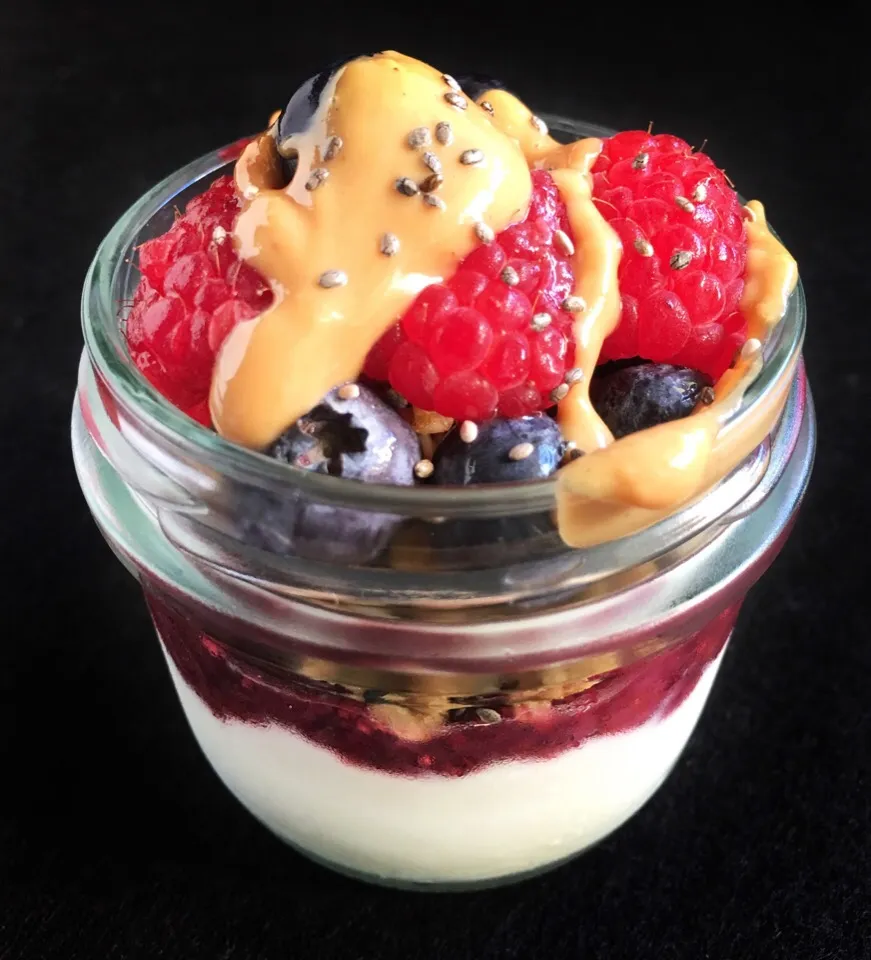 Breakfast jar - coconut yogurt, mixed berry chia jam, granola, berries, peanut butter|coxiella24さん