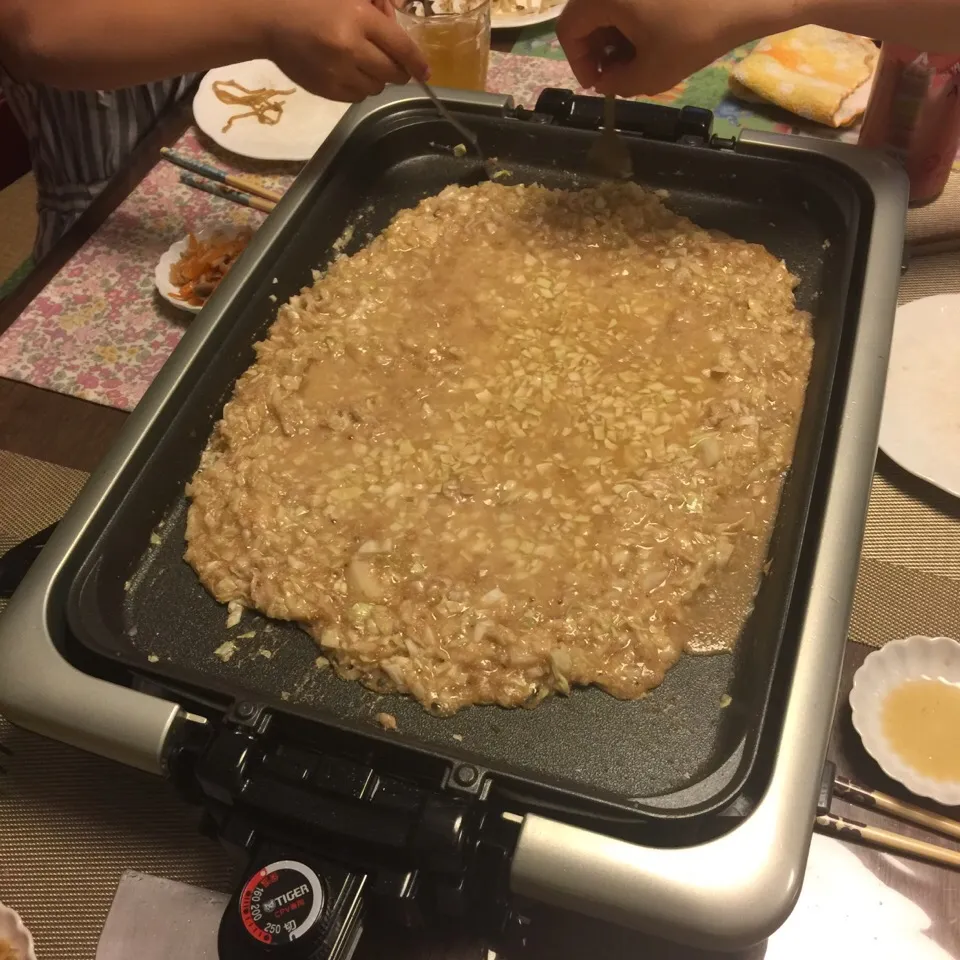 お家で、もんじゃ焼き😊チーズもち明太子が一番好きかな？|くめっちさん