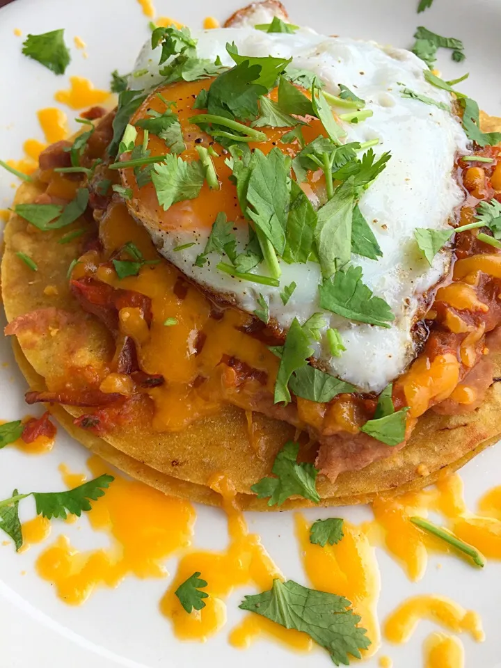 Huevos Rancheros with fire roasted tomato ancho chili sauce.|Chris Shannonさん